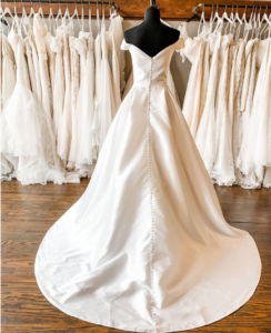 white bridal gown dressed on mannequin